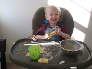 My little baking "helper." We made muffins and he got his own bowl to mix up a messy concoction of ingredients.