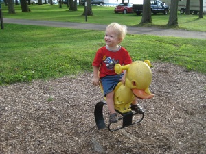 His favorite thing on the playground: The creepy duck, which he named "Quackington."