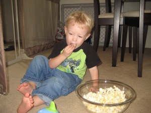 He love popcorn just like his Daddy.