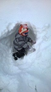 Fun in the snow digging tunnels and making a "castle" with Daddy.