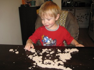 Playing with some "Sculpty Sand" which he is really loving and has been asking for frequently.